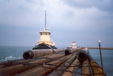 Marie-J while under Coastline Marine Flag with Dredge Pipe Raft, Atlantic City, NJ